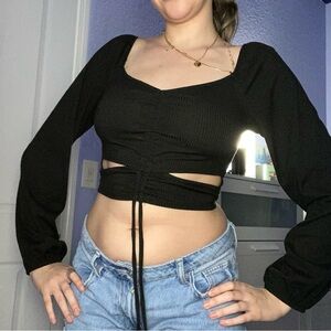 Black long sleeve crop top with cutouts